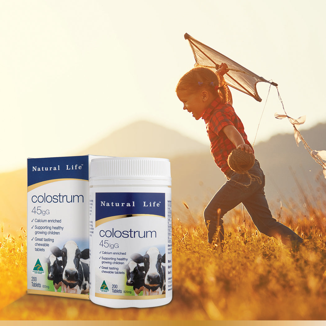 Natural Life Colostrum 45igG 200 tablets with stock photo of a child flying a kite